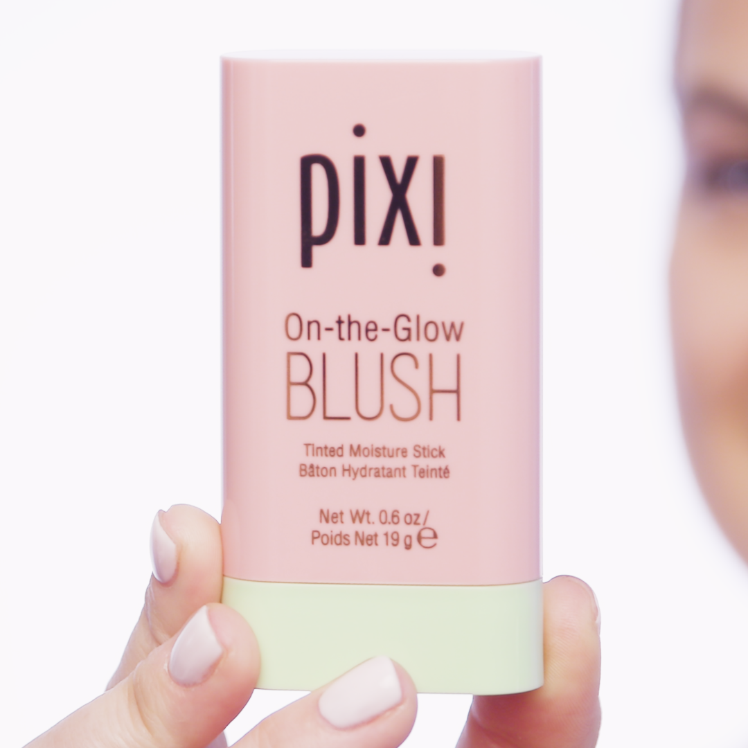 On-the-Glow Blush Stick in hand