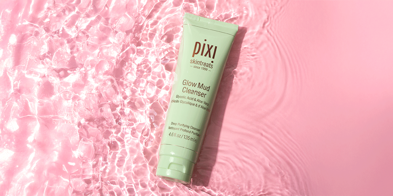 Rose Cream Cleanser, Clarity Cleanser and Glow Mud Cleanser shown with water